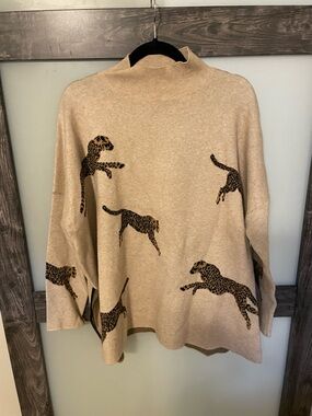 Shop the mint leopard sweater